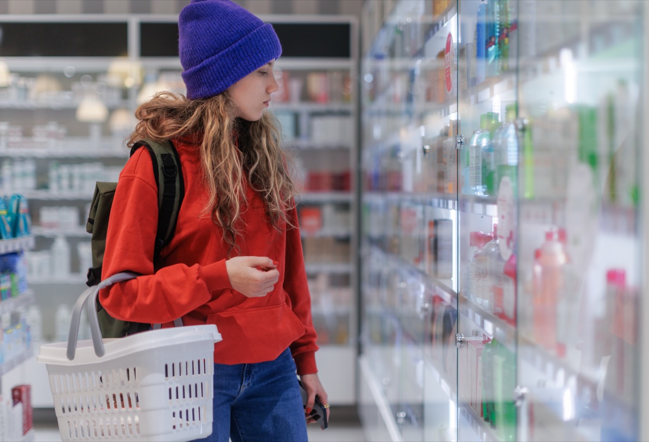 young-woman-choosing-a-medication-in-pharmacy-stor-2024-10-20-20-05-03-utc.jpg