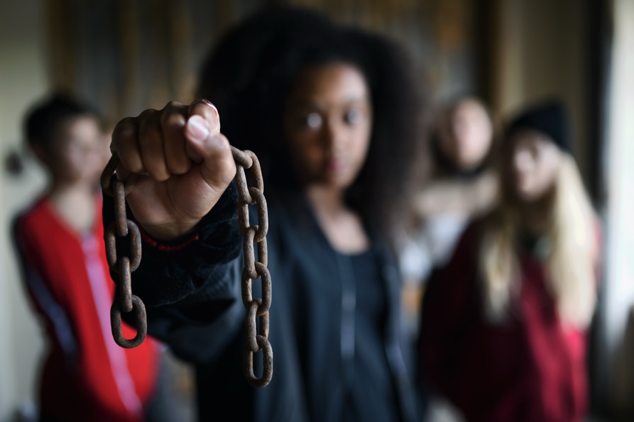 portrait-of-mixed-race-teenager-girl-with-chain-in-2025-10-02-06-17-41-utc.jpg