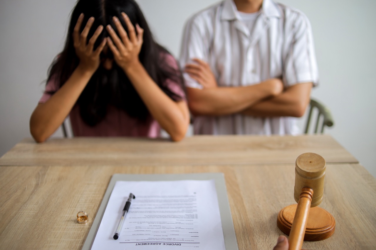unhappy-married-man-and-woman-filing-divorce-shar-2026-01-09-11-22-59-utc.jpg